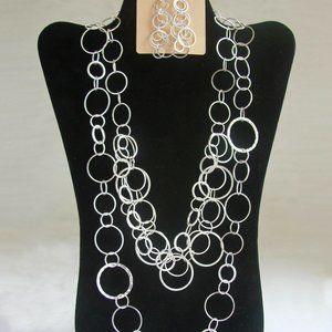Intersecting ring necklaces and matching earrings